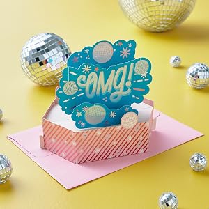 Congratulations pop-up card with "OMG" lettering and disco ball decorations