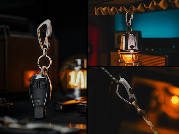 Composite image of a car key fob with carabiner attachment, alongside a small hanging lantern emitting warm light, showcasing outdoor or camping accessories.