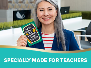 A teacher is happy receiving the end of year teacher cards from students.