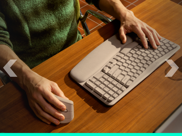 a person using a keyboard and a mouse
