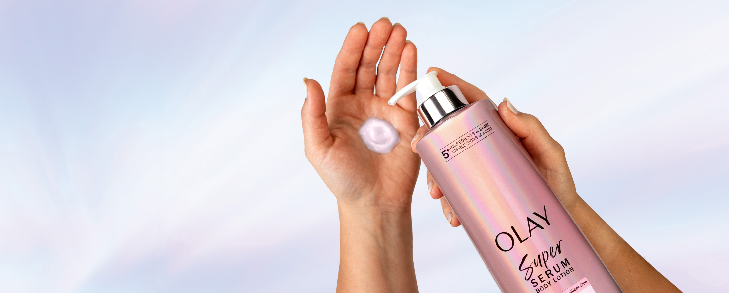 A person applying Super Serum body lotion on hand