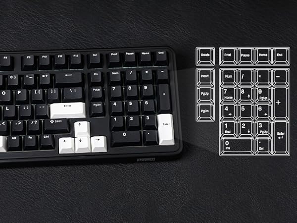 a computer keyboard with a broken keyboard on a table.