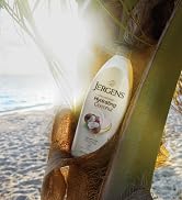 Bottle of Jergens Hydrating Coconut in a palm tree