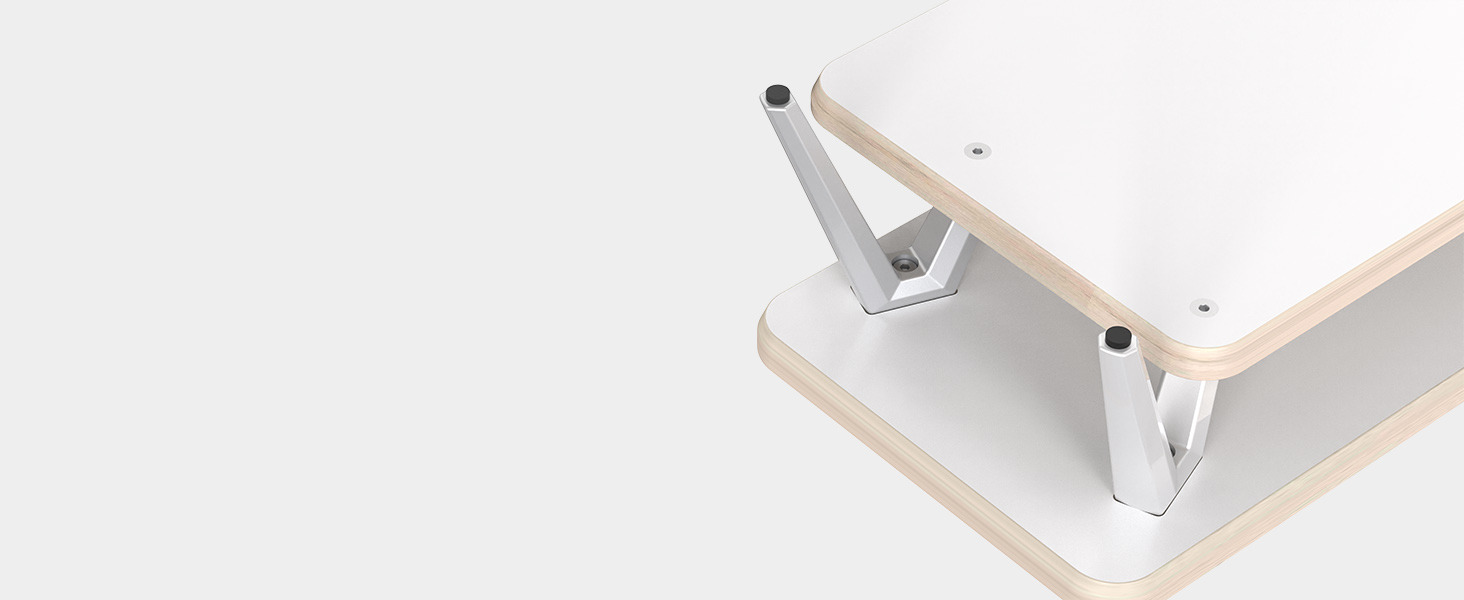 Close-up of a white electronic device corner, showing two adjustable metal legs or stands.