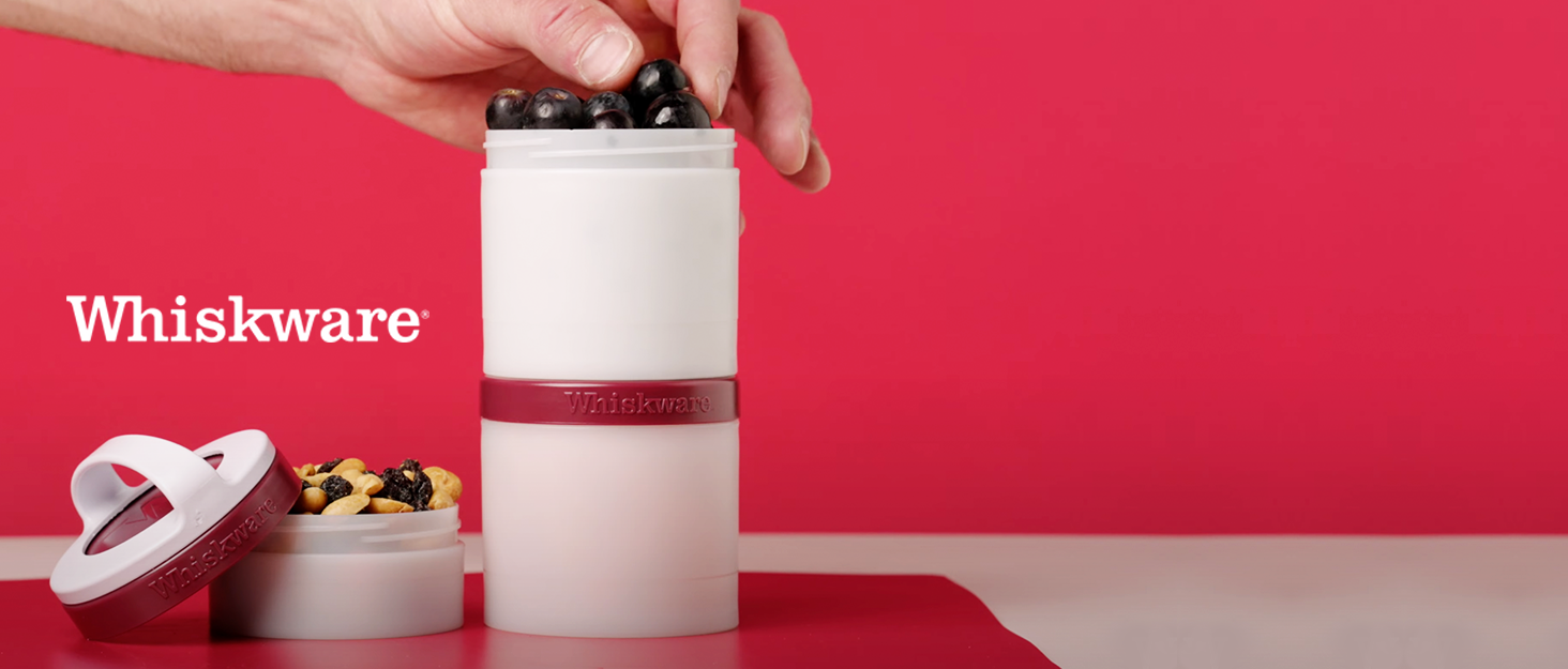whiskware snacking containers on red background