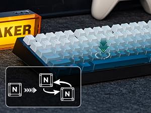 Close-up of a mechanical keyboard with illuminated keys showing navigation or tutorial interface elements overlaid on the image.