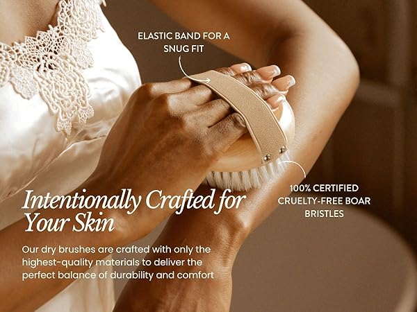 woman of color dry brushing their arm with a body brush inside their bathroom