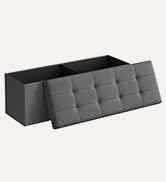 Black rectangular case or pouch shown in perspective view, displaying segmented or sectioned surface texture.