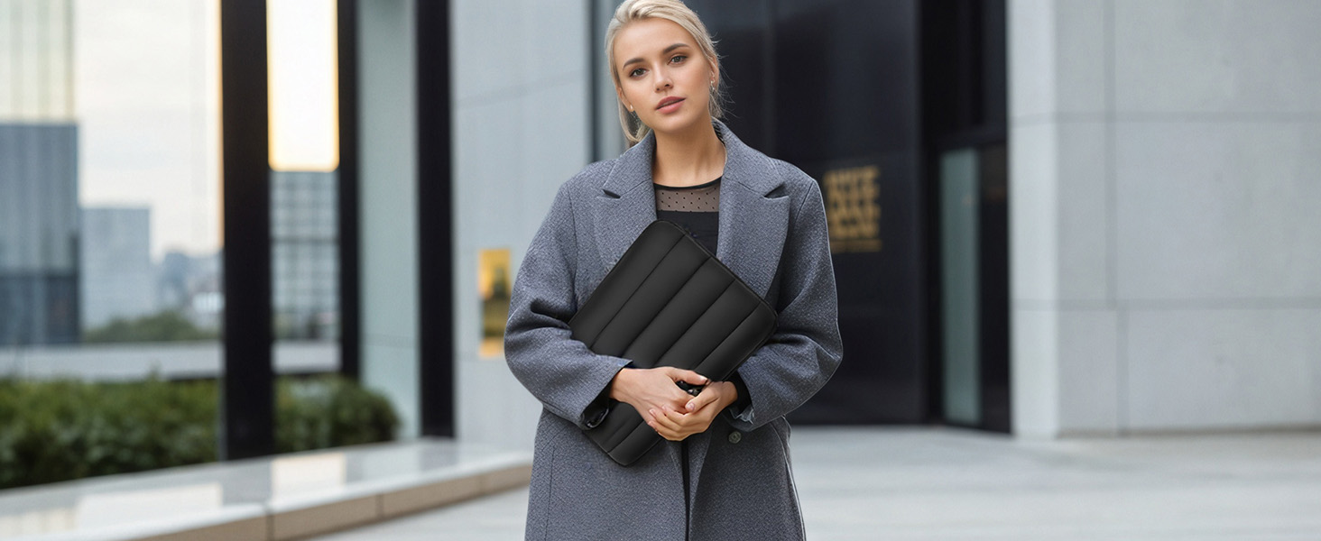 Black puffy laptop sleeve