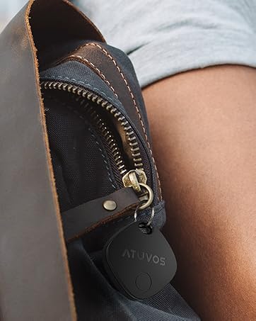 Close-up sequence showing a black zipper being operated, demonstrating smooth opening and closing motion.