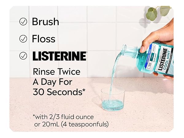 brushing, flossing, listerine rinse twice a day with 2/3 fluid ounce or 20 ml