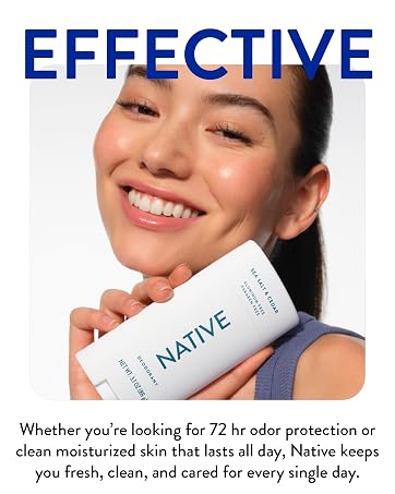 Woman smiling with Native's clean deodrant - showcasing Native's range of clean personal & hair care