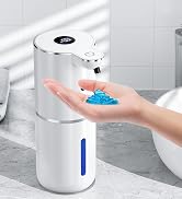 White automatic soap dispenser with sensor activation; hand dispensing blue foam soap, demonstrating touchless operation and product functionality.