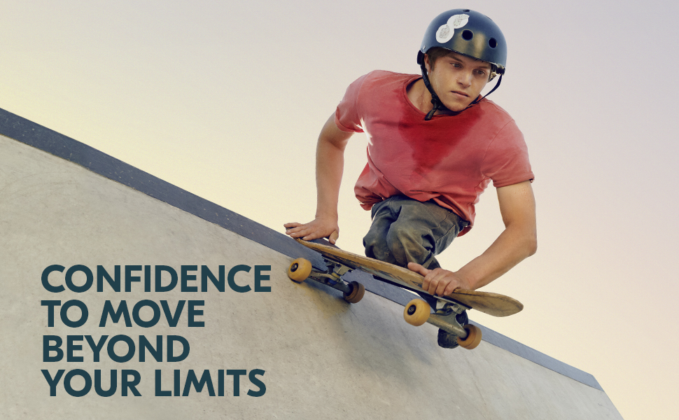 A man with a helmet on a skateboard