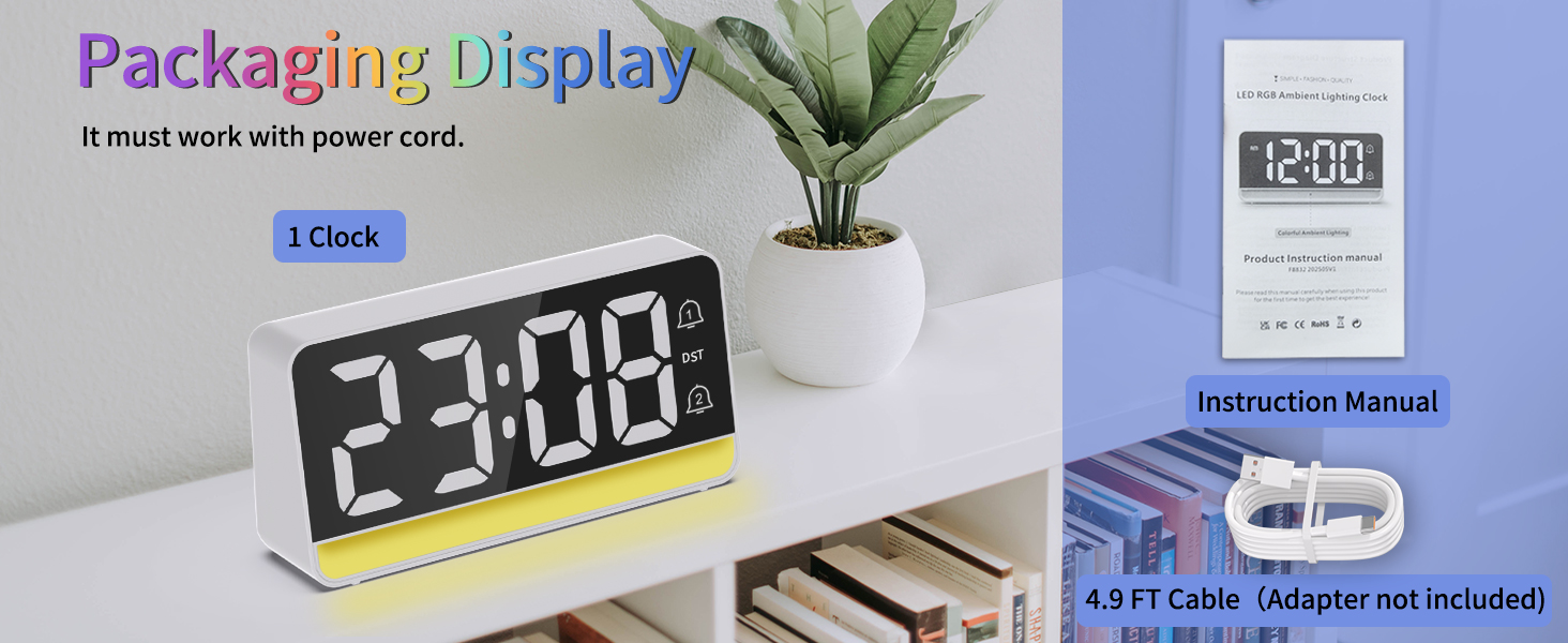 Includes: Clock, USB cable, manual. Requires power (no adapter included).