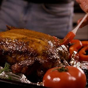 Meal being cooked with foil protecting the pan