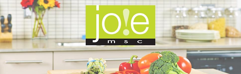 Kitchen setting with fresh veggies on the counter with the joie logo in the middle of the image