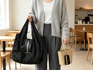 Black foldable nylon tote bag and its compact folded storage bag