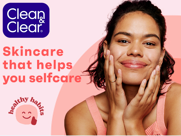 young woman smiling with great skin using Clean & Clear Essentials foaming facial cleanser