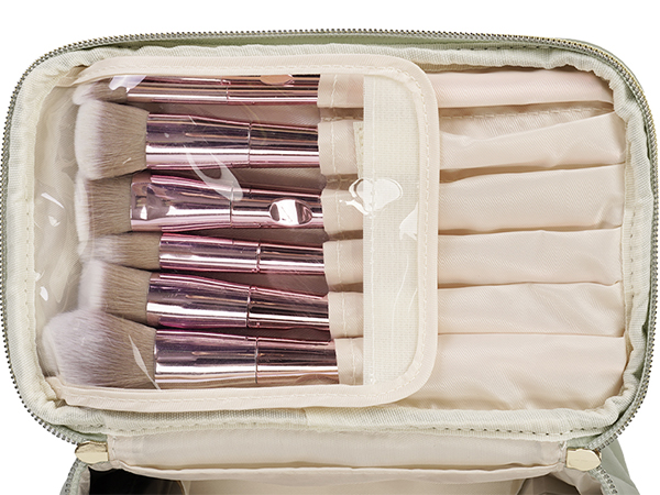Open makeup brush set in a beige zippered case. Features multiple brushes with rose gold handles and white bristles.