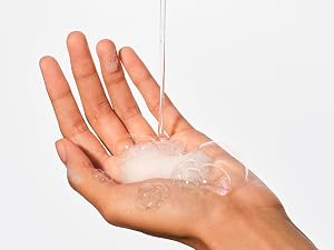 Native bodywash shown in hand, highlighting its clear nature and gentle formula