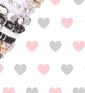 silver jewellry on heart print background