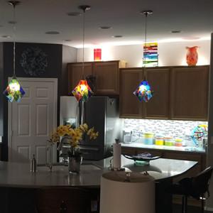 Above under kitchen cabinet light