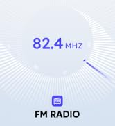 Digital FM radio display showing 82.4 MHz frequency. White circular design with blue text and radio icon. 'FM RADIO' label at bottom.