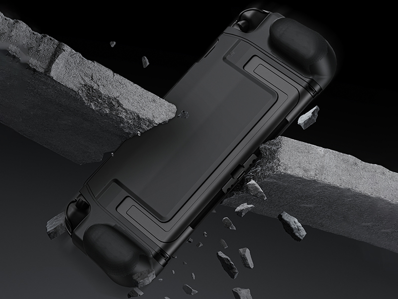 Black protective case for handheld gaming device, featuring a rugged design with raised edges and textured grips. Shown on a broken concrete surface suggesting durability.