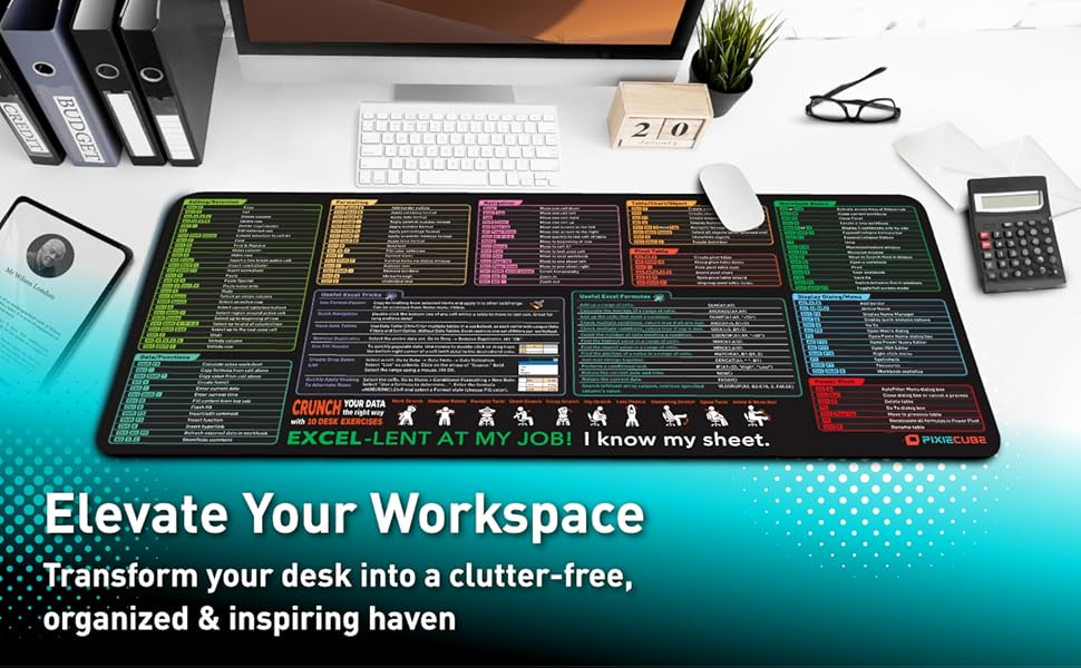Text reads 'Elevate Your Workspace Transform your desk into a clutter-free, organized & inspiring haven'. Large desk mat showing colorful keyboard shortcuts and commands on black background.