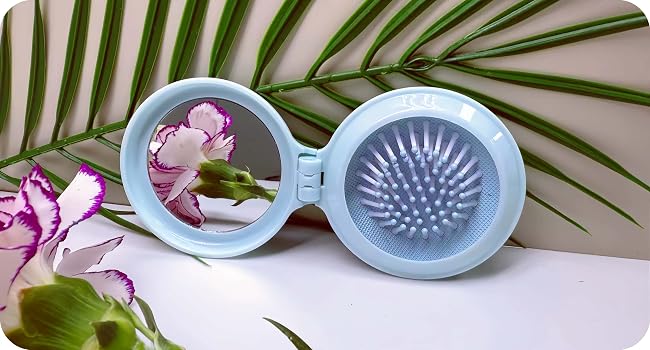 small mirror and brush