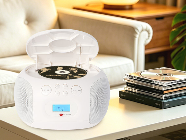 Press lid to pop open, insert a disc, then press play. Plays CDs, CD-R/RW, and burned MP3/WMA discs.