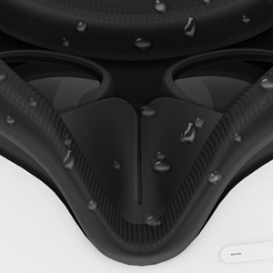 Close-up of a black, textured, curved surface with visible fasteners or rivets along the edges.
