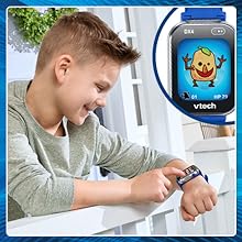 Kid presses screen buttons on DX4 to play exciting games like Monster Catcher and more.