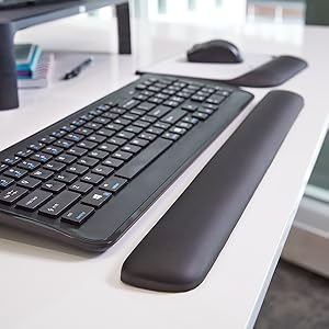 closeup of wrist rest next to a keyboard