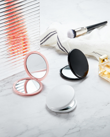 small dual-sided mirror