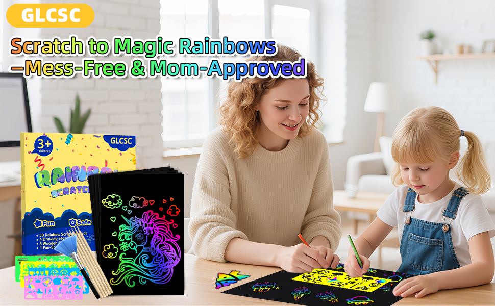 Mom and her little one joyfully painting on rainbow scratch paper.