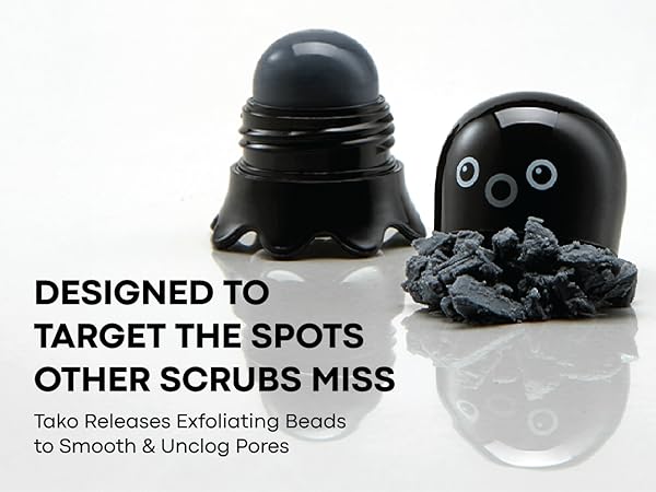 Tako Scrub Stick open and closed beside a mound of charcoal exfoliating beads on white background