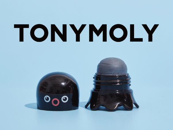 TONYMOLY Tako Pore Scrub Stick open and closed on light blue background.