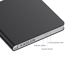 Slim black electronic device with textured surface. Features include indicator light, forced ejection hole, and ejection button.