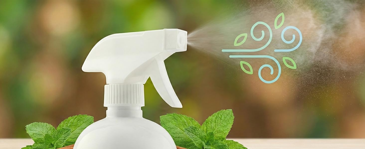 Close-up focusing on the spray mist coming out of the nozzle. graphic icon of a "Fresh Air" swirl.