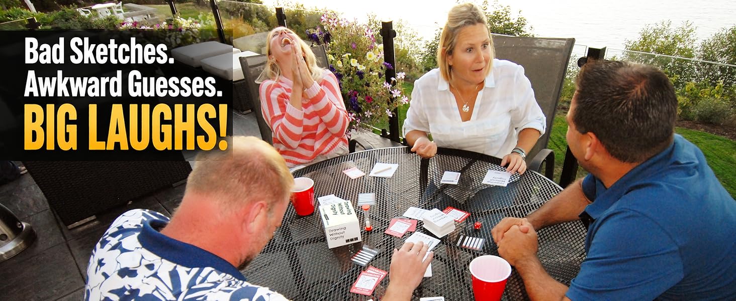 Adults laughing around a table with Drawing Without Dignty game spread out