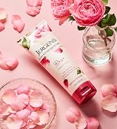 Jergens Rose Body Butter next to rose petals