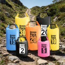 Waterproof dry bags in multiple sizes for hiking kayaking beach travel gear