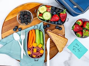 Packed lunch with cutlery on the side.