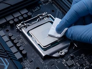 gloved hand cleaning CPU