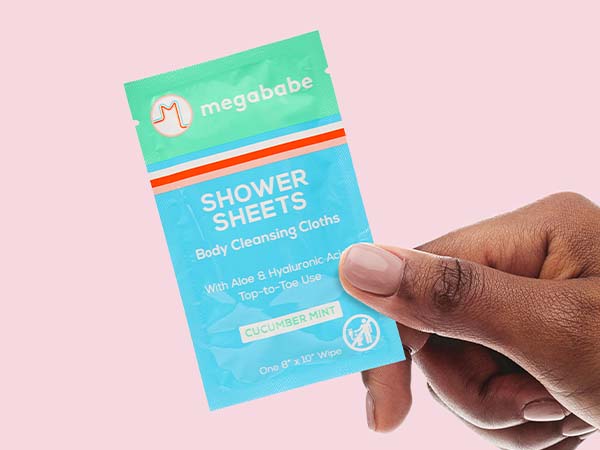 Shower sheets on pink background.
