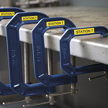 Rhino labels on four blue hooks