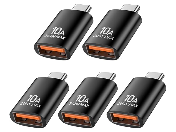 Multiple black USB-C adapters or dongles shown in different arrangements against white background, displaying various ports and connections.