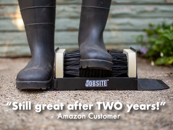 A scrubber in use next to a garage. Text reads "still great after two years. - customer"
